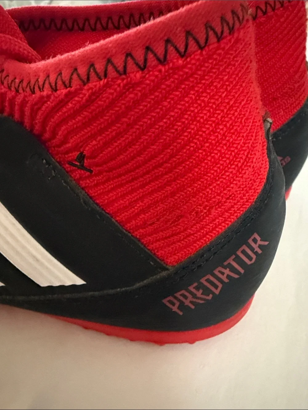 adidas Kids Black and Red Mid-Top Soccer Sneakers